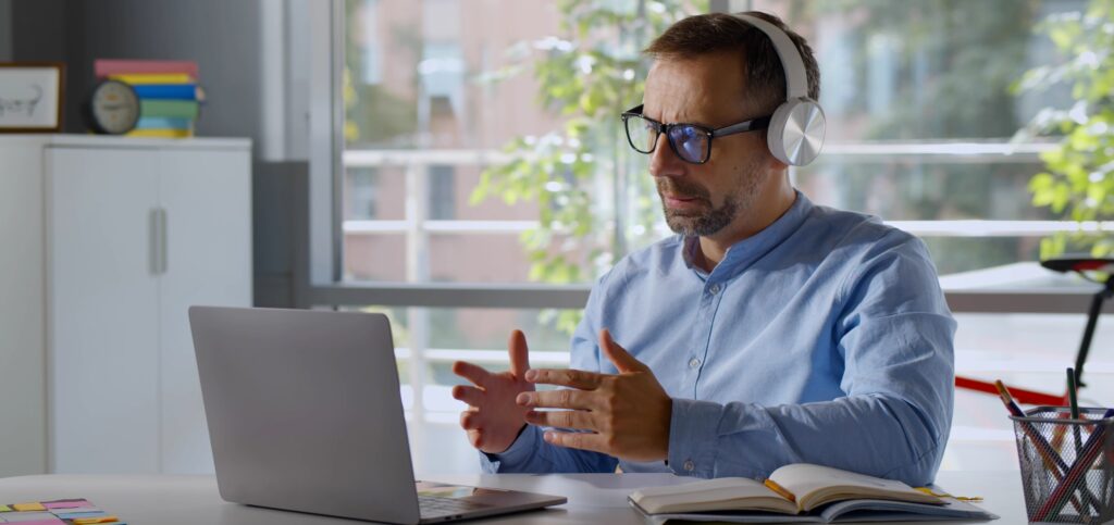 A teacher having a virtual parent teacher evening as another form of parental engagement