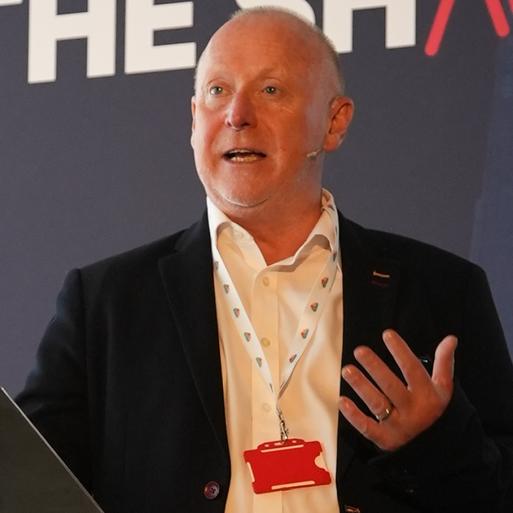 Mark Lovick speaking at Bromcom at The Shard annual event